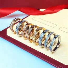 Volledige diamanten liefde schroefring herenringen klassieke luxe designer sieraden dames titanium staal legering verguld goud zilver roos ne309e