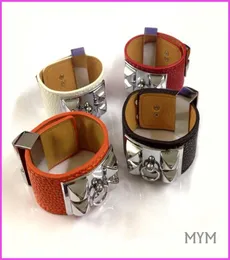 Lega moda punk grandi rivetti Bracciale in acciaio al titanio con pelle in molti colori Donna e uomo Piastra con marchio in argento je2191408