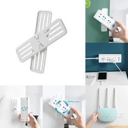 Nya förvaringspåsar Ny 1 st väggmonterad klistermärke Punch-Fri Plug Fixer Home Self Adhesive Socket Fixer Cable Wire Organizer Seamless Power Strip Holder