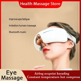 Masseur pour les yeux intelligent sans fil Bluetooth musique protecteur pour les yeux pliable protecteur pour les yeux pression de l'air vibration compresse pétrissage masseur pour les yeux 231211