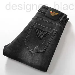 メンズジーンズデザイナージーンズファッションブランドブラック刺繍ホットビーズ弾性スリムフィットスモールフィートカジュアル韓国デニムロングパンツDX50