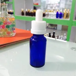 600 garrafas conta-gotas de vidro dos pces 30ml 5ml 10ml 15ml 50ml e-líquido ejuice garrafas de vidro azul do óleo essencial com rubbe294o à prova de crianças