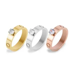 Classico amore solitario fede nuziale per donna uomo Anelli per dito medio acciaio al titanio 316L zirconi cubici Aneis Anel Bague Femme 4451999