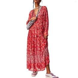 Robes décontractées Les femmes voient à travers la robe de plage imprimé floral à manches longues boutonné encolure avant ourlet inférieur tourbé et fabrication semi-transparente