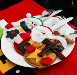 12pcs ثلج Snowman Santa بدلة سكاكين السكاكين حقيبة حقيبة جيوب الجدول عشاء ديكور عيد الميلاد العام الجديد ديكورات عيد الميلاد للمنزل 8125675