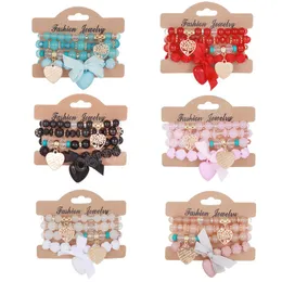 Set di braccialetti in tessuto elastico multistrato della Boemia per donna, cuore, farfalla, nastro, perline, braccialetto combinato, gioielli con ciondoli