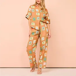 Conjunto de pantalones rectos y camisa de manga corta de lino color caqui de diseñador australiano
