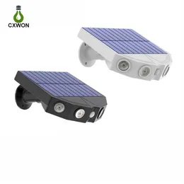 Confezione da 2 pezzi Lampade solari per esterni Design di monitoraggio imitazione Lampione stradale a 4 LED Sensore di movimento Lampada da parete impermeabile per giardino Courtyar304H