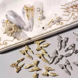 Nagelkonstdekorationer 50 st 3d legering båge skönhet design guld silver bowknot strass glänsande charm 9x15mm band manikyr smycken ornament