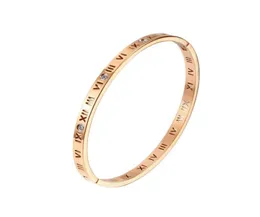 Bracciale con numeri romani con chiusura in oro rosa e anello di diamanti F11309416070