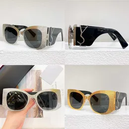Ladies Cat Eye Designer نظارة شمسية فضية معادن نحتت العدسة السوداء العلامة التجارية