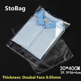 StoBag 100pcs 30 40cm Transparente Autoadesivo Plástico OPP Resealable Poly Celofane Roupas Sacos Embalagem Transparente Saco de Presente Y1202216w