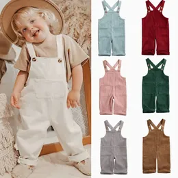 Jumpsuits 0 5y Baby Corduroy Suspender Pants Boys Girls Autumn kläder barn ärmlösa lösa overaller romper med fickor 231214