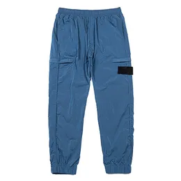 Designer-Hose, Metall-Nylon-Tasche, besticktes Abzeichen, Freizeithose, Marke, dünn, reflektierende Jogginghose, Topstoney, einfache elastische Taille, Frühlings-Herbst-Designerhose