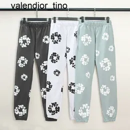 Nova marca de moda das mulheres dos homens designer puff impressão flor calças das mulheres dos homens com cordão preto sweatpants macacão dos homens woemns