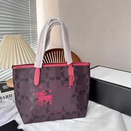 Mode shopping handväskor stor kapacitet pendlare väska designer tote väska märke snöflinga bågtryck korg axel väskor messenger väska