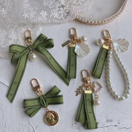 Tasarımcı zincir çanta kadın araba anahtar yüzüğü inci cazibesi yeşil kurdele narin kabuklar ggg anahtarlık çift kolye hediye güzel