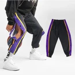 Pantaloni Haruku Pantaloni sportivi da uomo alla moda Pantaloni sportivi da basket per esterni quotidiani Pantaloni creativi con design a mosca con bottoni a righe laterali