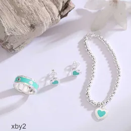 Braccialetti con ciondoli T Jia Di Bracciale Boutique Gioielli Regalo di San Valentino Cuore d'amore Marchio Colla cadente Set di smalti Anello per orecchio 2024 DESIGNER