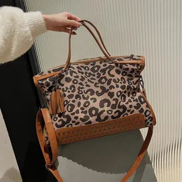 Factory sales women shoulder bags 2 colors French leopard print handbag large wear resistant matte leather tote bag this year's popular fringed rivet handbags 5502#