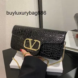 Kvinnor Handbag V Western Style liten väska för 2023 startnivå Ny high-end textur Snake Mönster Enkel axelkedja Kvinnors fashionabla bärbara