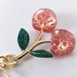 2024 Nya nyckelringar Klipp Coa Ch Cherry Keychain Bag Charm Decoration Accessory Pink Green High Quality Luxury Design 231218