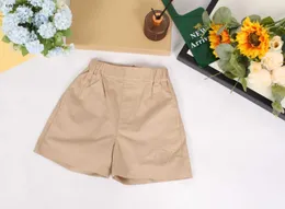 Nowe spodenki dla dzieci Summer Kids Designer Rozmiar 100-150 Minimalistyczny projekt Khaki Design Dziewczyny Chłopcy Pół spodni dec05