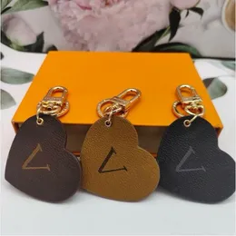 Very Cute Peach Heart True Leather Keychains Car Keychain Fashion Pendant Paris Brand Key Ring for Charm Men Women Have Original Gift Box Elies Vittonlies