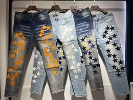 Zerrissene, orangefarbene Amiryes Star Patch Slim Fit Little Feet Star Stretch-Lochjeans für Herren aus Denim in US-Größe