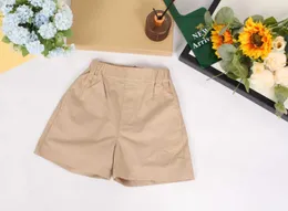 Luksusowe spodenki dla dzieci Summer Kids Designer Ubrania Rozmiar 100-150 Minimalistyczny Khaki Design Dziewczyny Chłopcy Half Pants Dec05