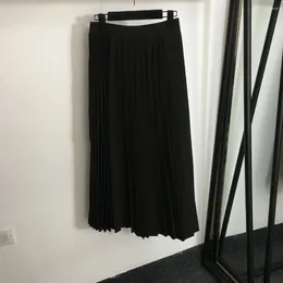 Jupes Jupe plissée noire Femme dans la longue taille haute A-ligne 2023 Automne et hiver Taille élastique en laine