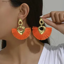 Dangle Chandelier Wholesale Bohemian Vintage Colored cotton Tassel Earrings Heart hollow design Pagoda fan Dangling Earrings Eardrop FemaleL231219