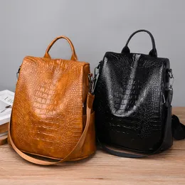 Vendas Mulheres Bolsas de ombro 2 Cores Backpack de couro macio de couro simples Anti-roubo Zipper Moda Backpacks Joker Bolsa de Crocodilo em Relevo Sólida 9035