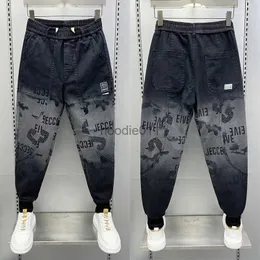 Jeans da uomo sfumati neri Harem Jeans lettera modello stampato amore pantaloni moda strada hip hop pantaloni marchio di lusso abbigliamento da uomo L231220