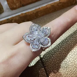 Anelli nuziali Forma di fiore Grande Cz Zircone Bling Argento di lusso per le donne Fascia di fidanzamento nuziale Promessa di pietra Gioielli femminili260s