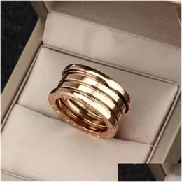 Med sidor med Box Fashion 316L Titanium Steel Zero Ring Side Stones Parringar för män och kvinnor Band Drop Leverans smycken DHG1N