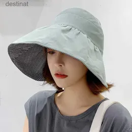 قبعات واسعة الحافة قبعات دلو 2023 جديدة من الإناث الكورية العصرية واقي من الشمس قبعة كبيرة الحافة UV رحلة الشاطئ