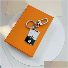 Chaços de teclado designer de pato pato -chave saco de charme de charme de pingente masculino de titânio keychain letra de keyring manual de keychai dhlh6