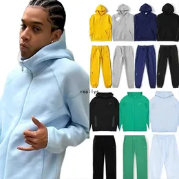 Męski garnitur sportowy Nocta Designer Projektant Bluet Pantie Zestaw Kobiet Kobiet Down Down Pullover Hooded Swater Spodnie ścieżki dna Bodę bieżące joggers płaszcz ee ee ee