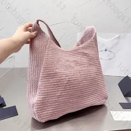 Fretwork Bolsa de designer de designer bolsa de praia tricô de luxuris Bolsas de lúcios tecidos bolsas de malha bolsas de compras oca de verão bolsas de malha de malha de malha