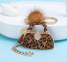 Fashion Leopard Print Ball Bolsa Keychains charme para mulheres pendentes de pingente de luxo anéis de carro Chain Chain Keyrings9636939