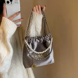 Jesień łyżki wodnej i zima nowe aksamitne jedno ramionowe ręczne ręczne Pearl Crossbody Bag damska czułe uczucie