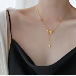 Fly från prinsessan guld båge halsband kvinnors långa mes stycke kedja set kedja kärlek hänge tofs collar kedja dekoration