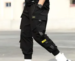 2021 New Men039s Cargo Harem Harem Pants Hip Hop Casual Male Joggers Брюки моды уличная одежда пробегает брюки в японском стиле.