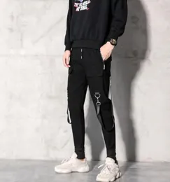 Январский дизайнер бренд Men Streetwear Black Harem Pants Light Men Punk Punts ленты ленты повседневные тонкие брюки для бега