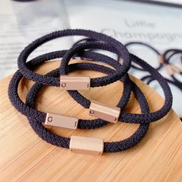 Ganze Designer Mode Luxus elastische Haarbindungen Band Haarseil Armbänder Stirnband -Ornament mit Metallschnallen Accessoires231t