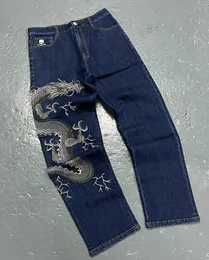 Jeans stampati con motivo drago Uomo American Street Trend Hip Hop Pantaloni larghi vintage alla moda tutti abbinati 231222