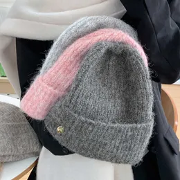 Cappello maglione a maglia rotonda con colore solido coreano per le donne in autunno e inverno per sfoggiare il viso per cappellino per pile calde