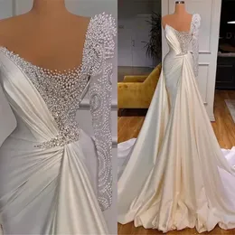 2024 Sexy Luxury White Mermaid Wedding Dress Illusion Pearls Beadings One Shoulder Satin Long Sleeve Plus Size Bridal Gowns Vestidos De Noiva