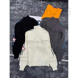 Kadın Sweaters Designer 2023 Kış Yeni Kontrast Renk Çizgisi Renkli Desen Örme Uzun Knöğretli Daimi Boyun Süvarisi Kadınlar Sıcak ve Zayıflama Üst K5XV